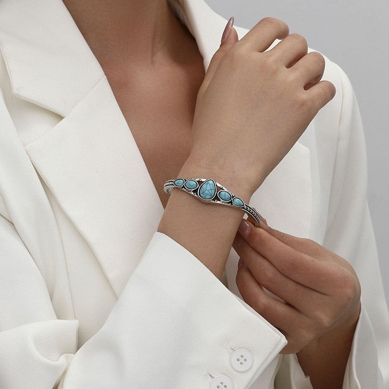 Bracciale Aperto a Goccia Turchese | Oro Bianco